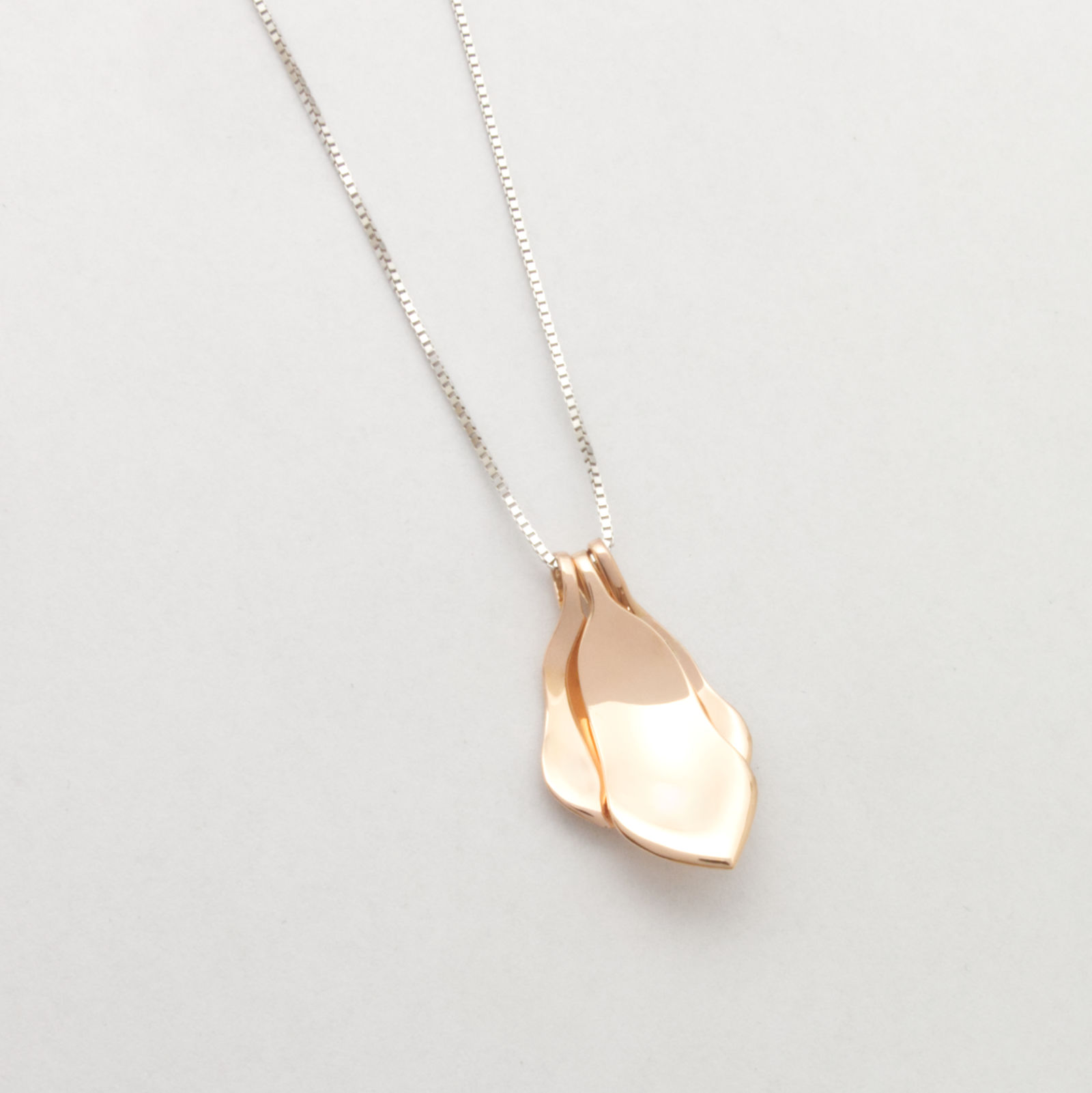 Handcrafted sustainable jewellery with memory of a magnolia tree..